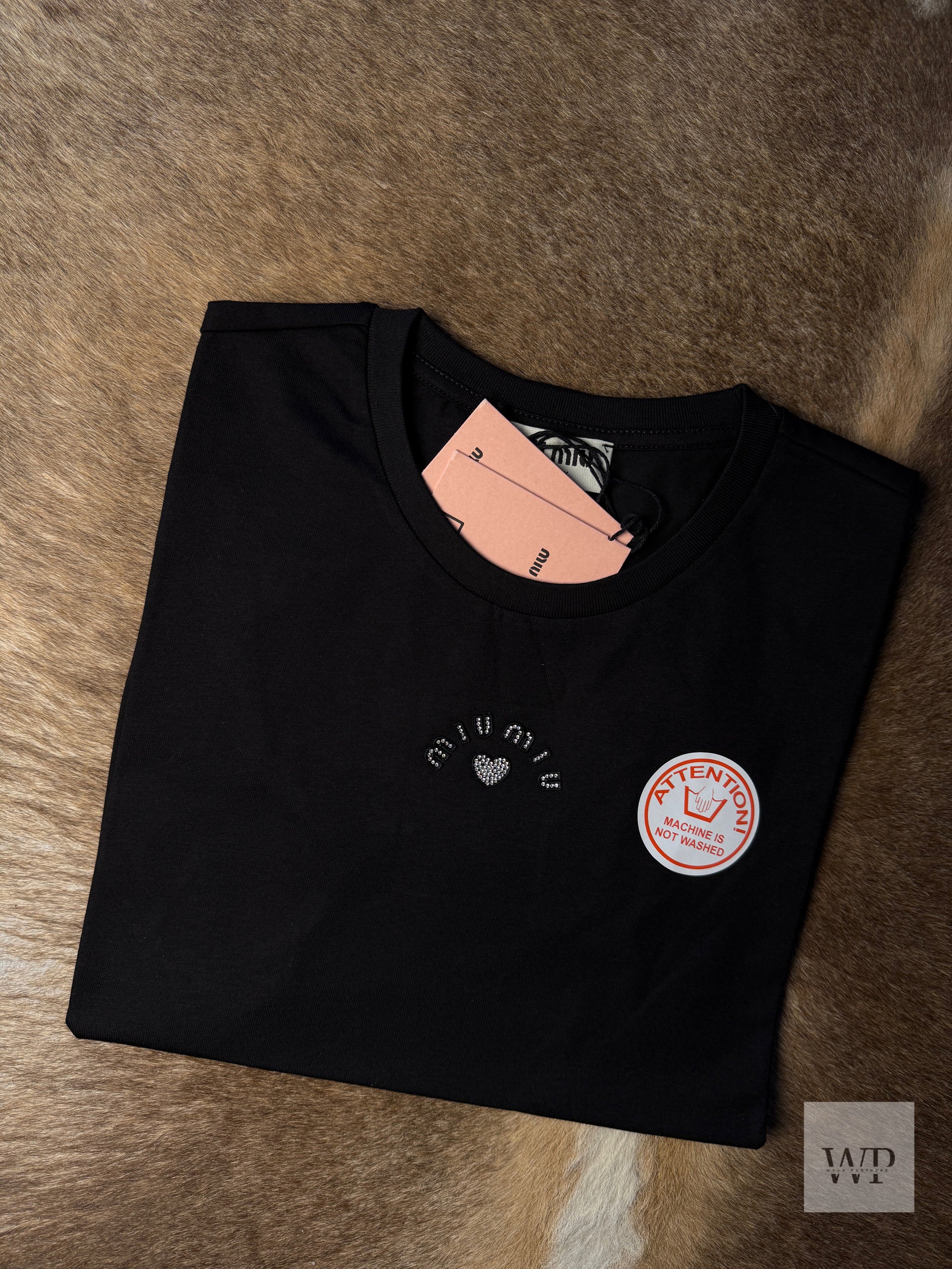 MM black shirt logo strace