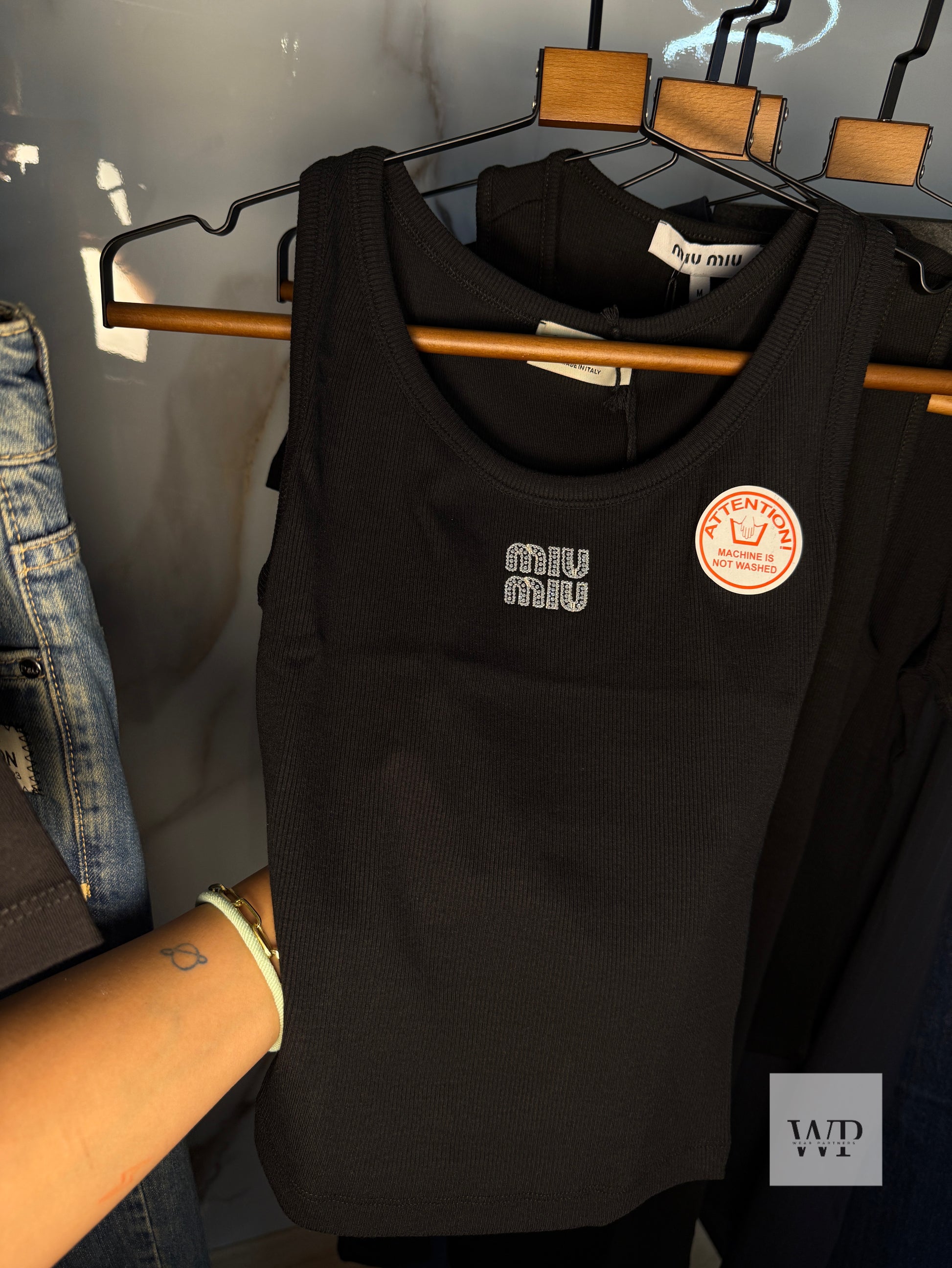 MM black tank top with strace logo